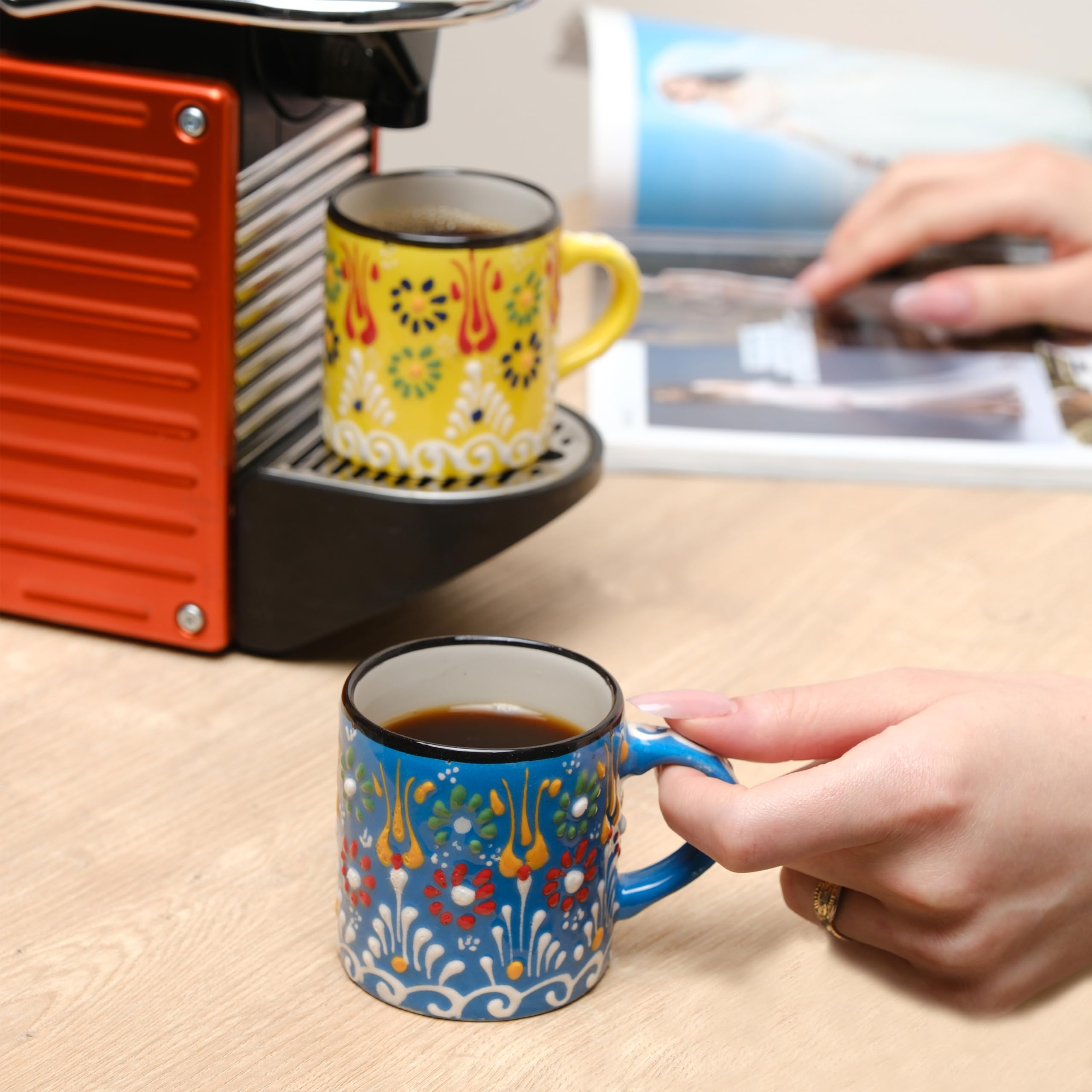 Close-up of Elyese cup marking indicating dishwasher and microwave safe convenience