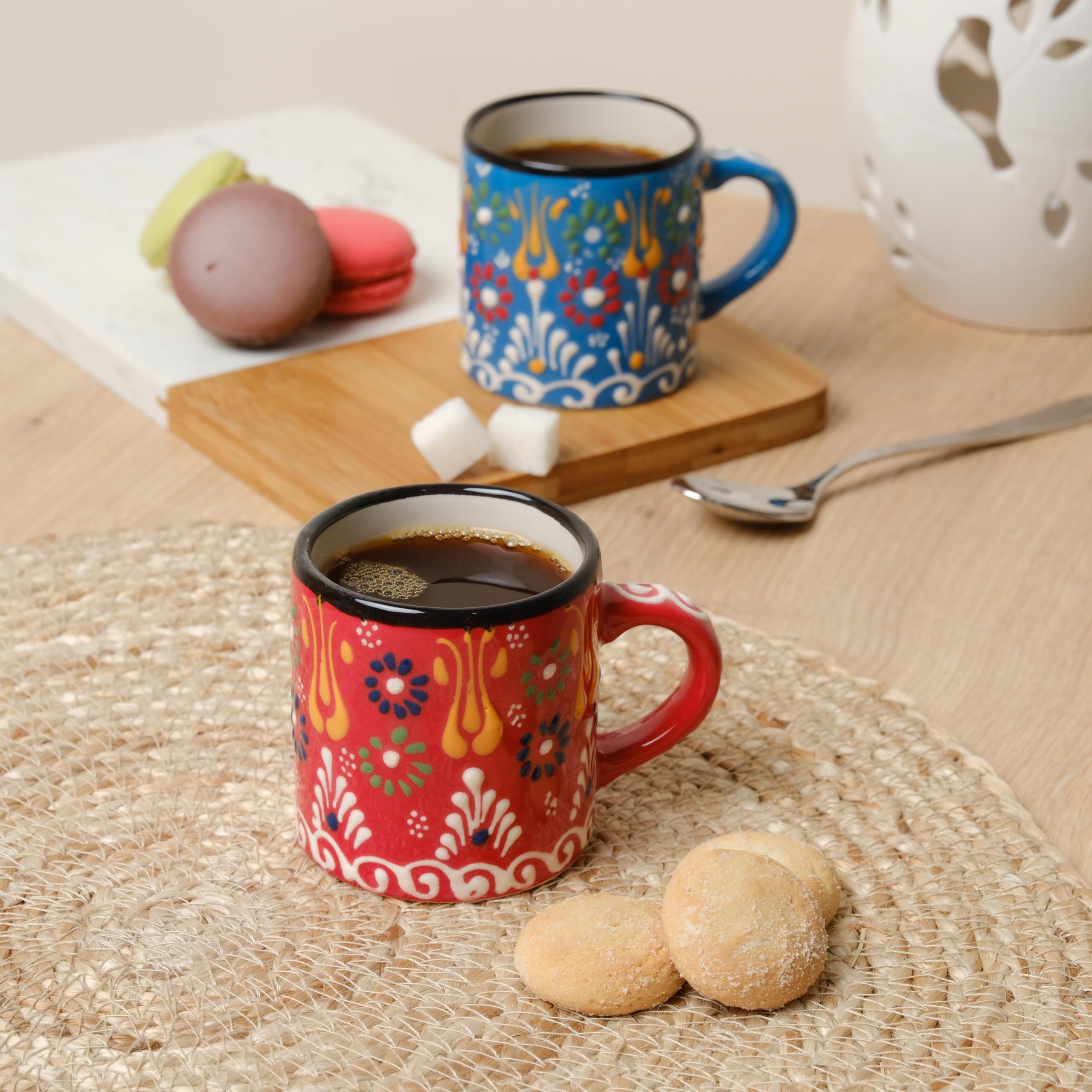 Set of Elyese cups on wood table styled in a kitchen for a warm lifestyle serving scene