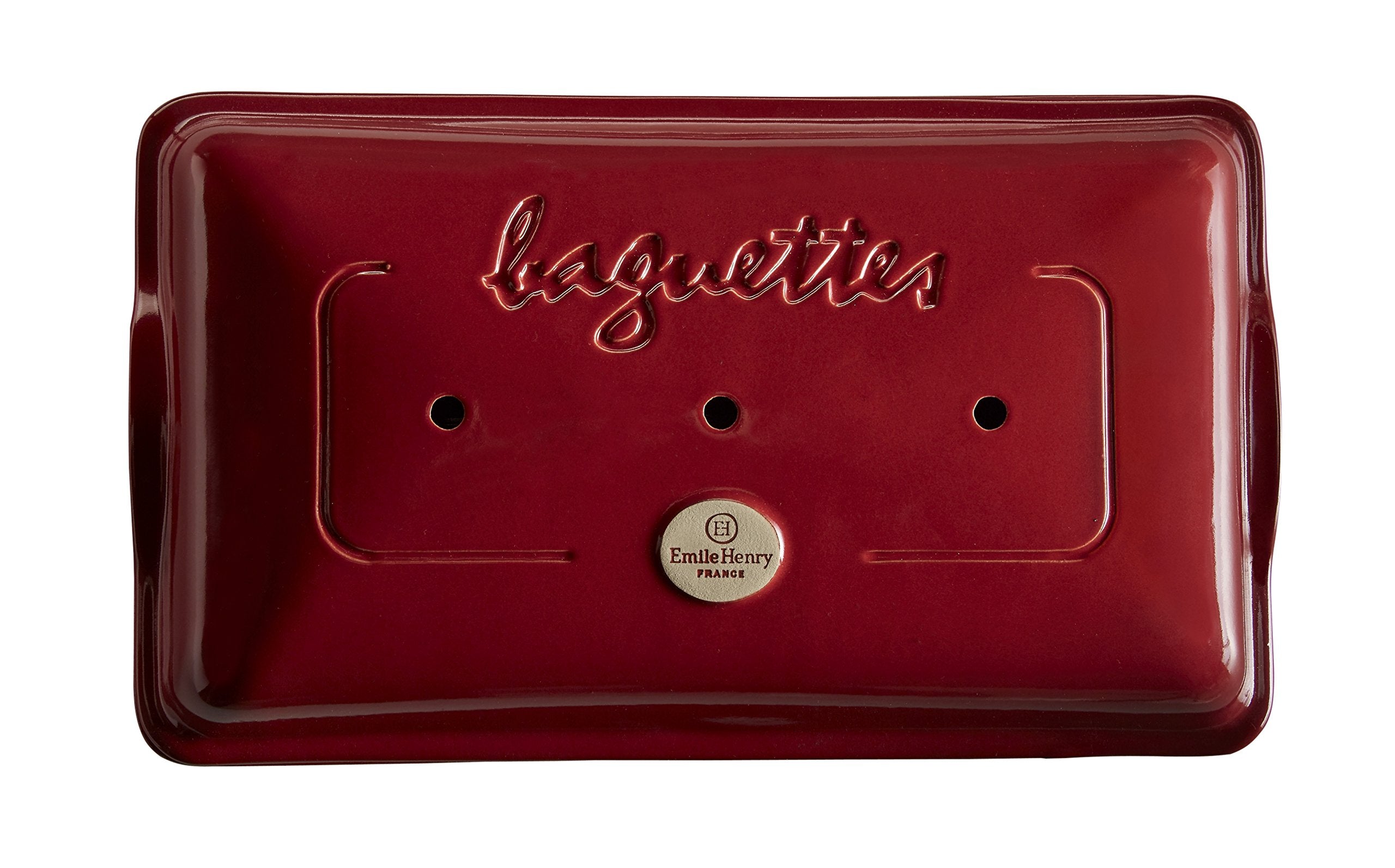 Emile Henry baker with shaped dough in grooves demonstrating easy loading and uniform shaping