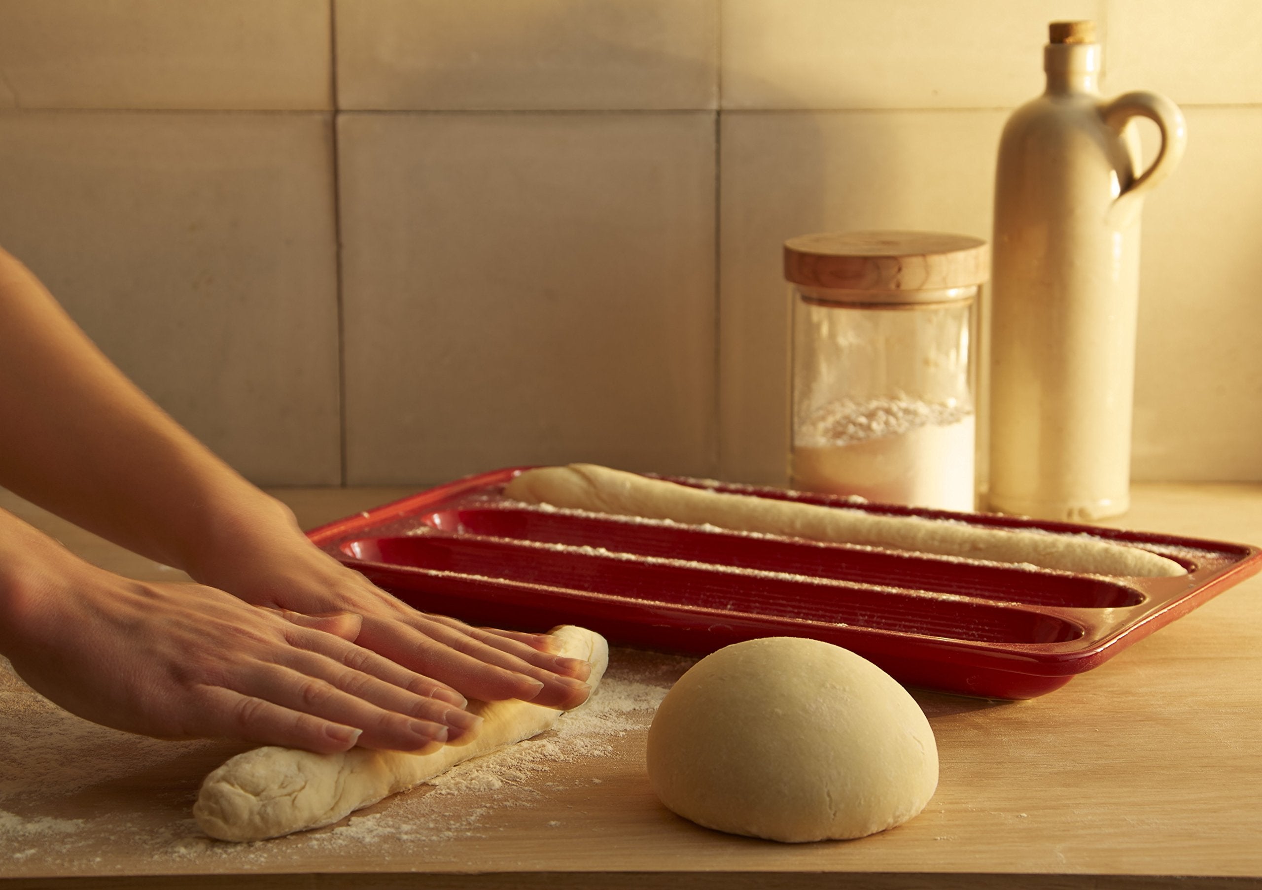 Emile Henry finished baguettes removed from baker showing artisan crust and appealing presentation