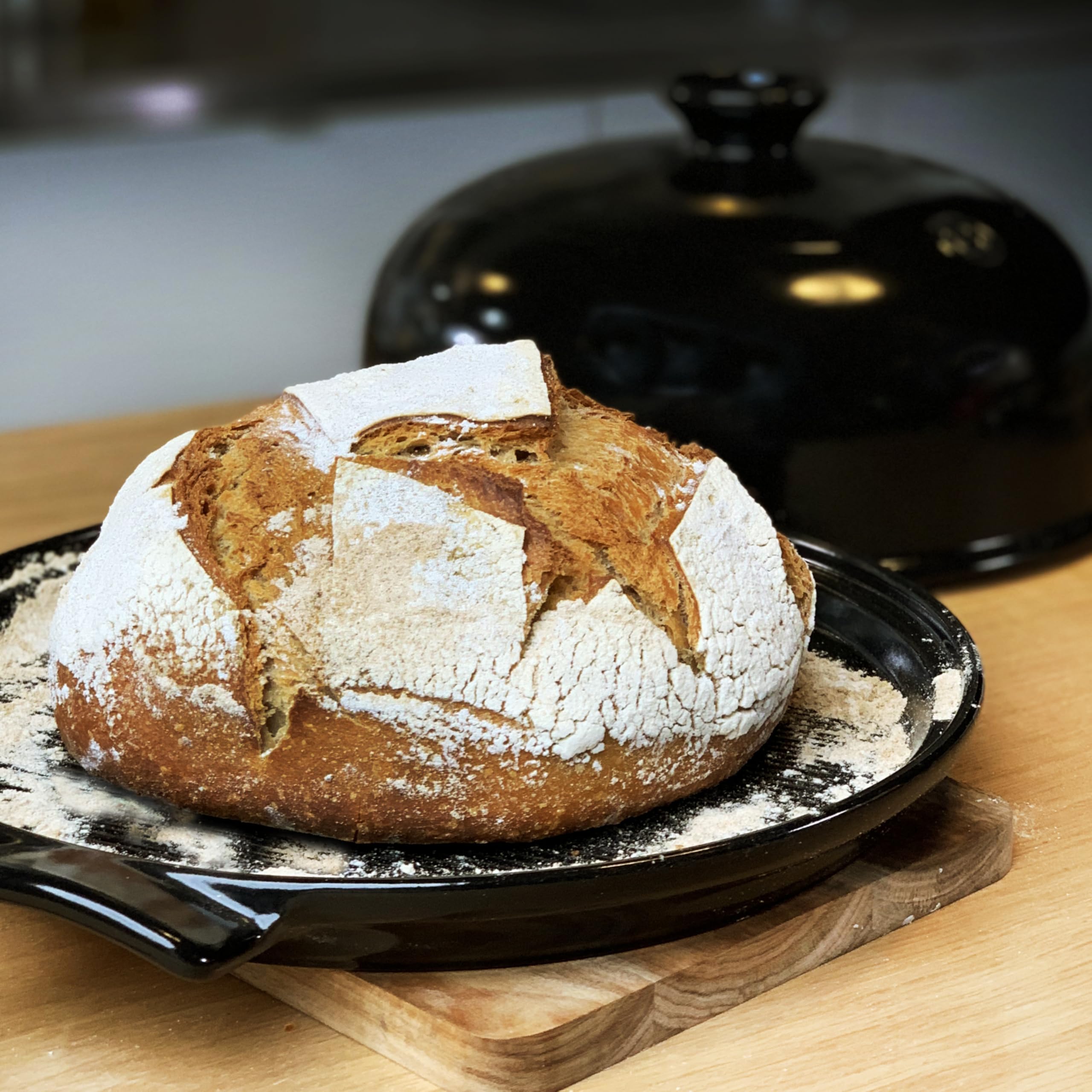 Emile Henry cloche staged on countertop illustrating artisanal baking at home