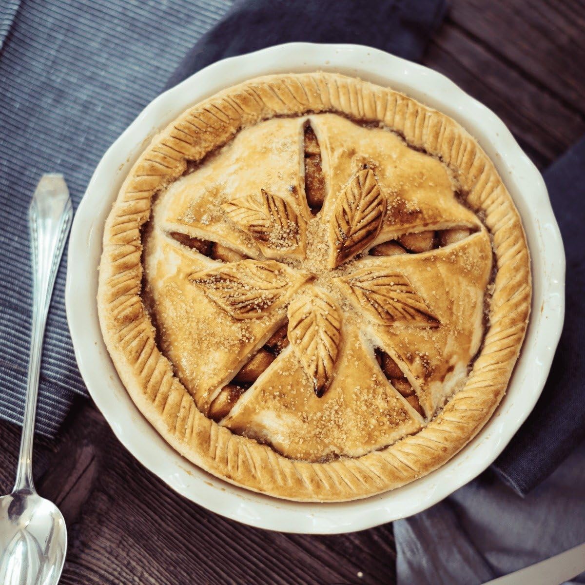 Emile Henry pie dish with baked pie inside demonstrating even browning and serving-ready look