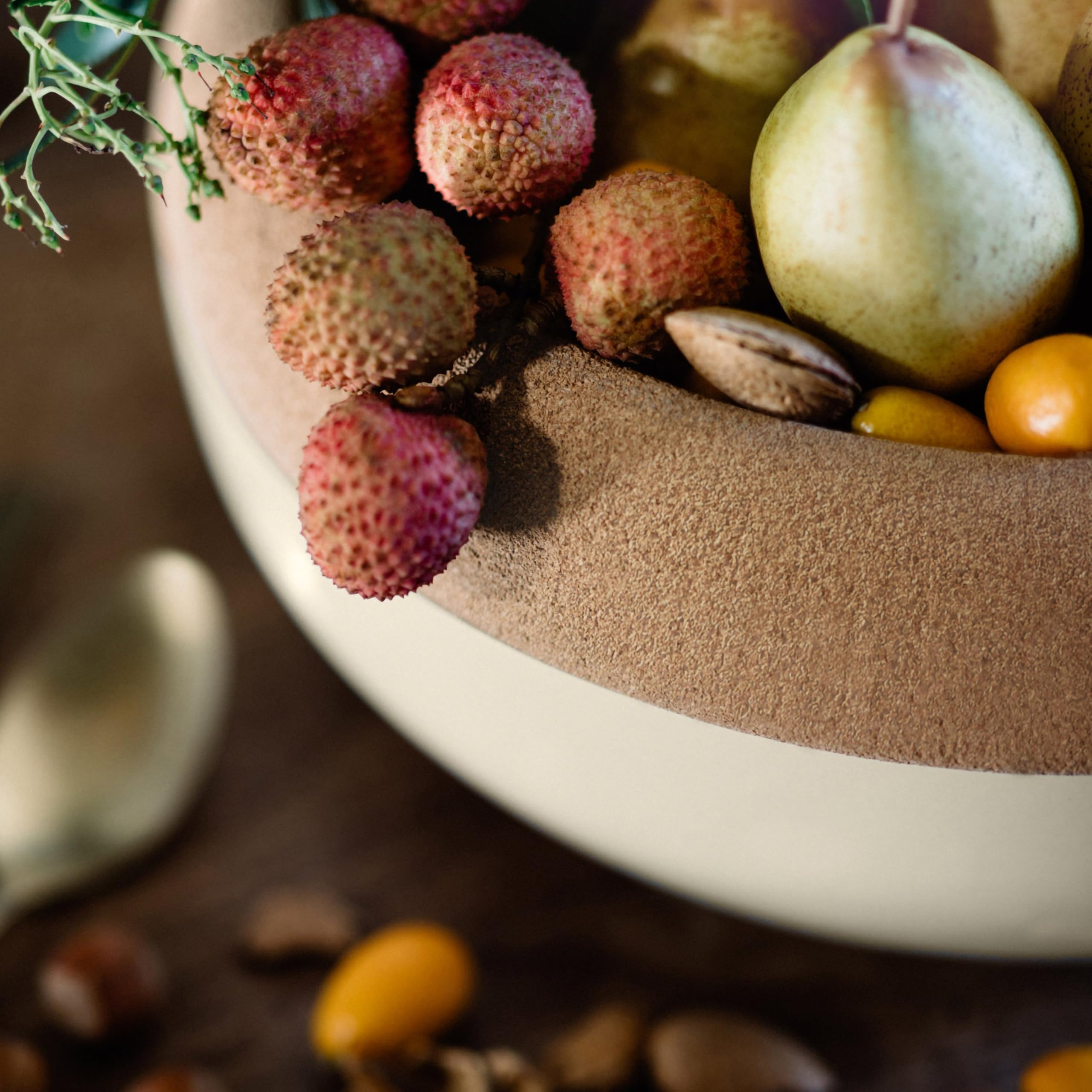 Emile Henry bowl on kitchen counter next to common items showing size and scale