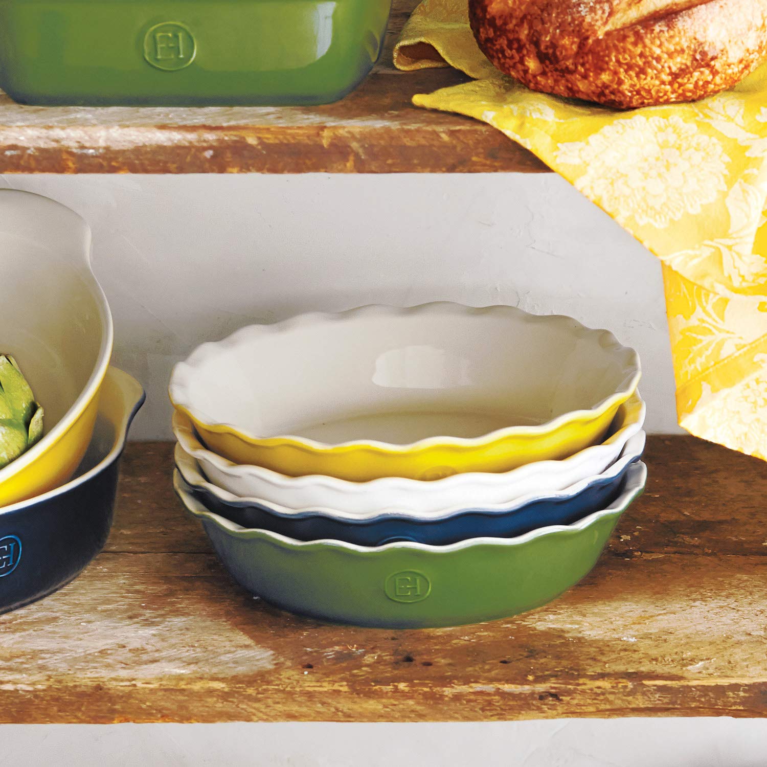 Emile Henry Twilight pie dish with hand for scale showing ideal 9-inch portion size