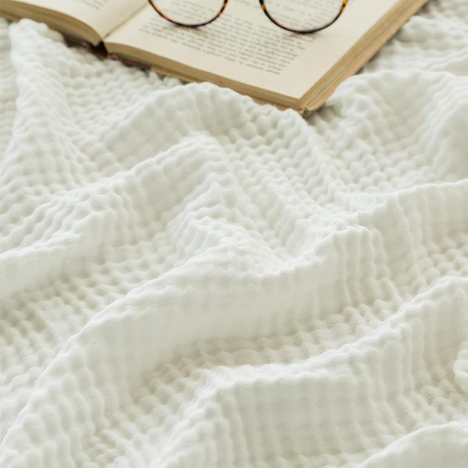 EMME blanket full drape on bed showing soft, breathable comfort