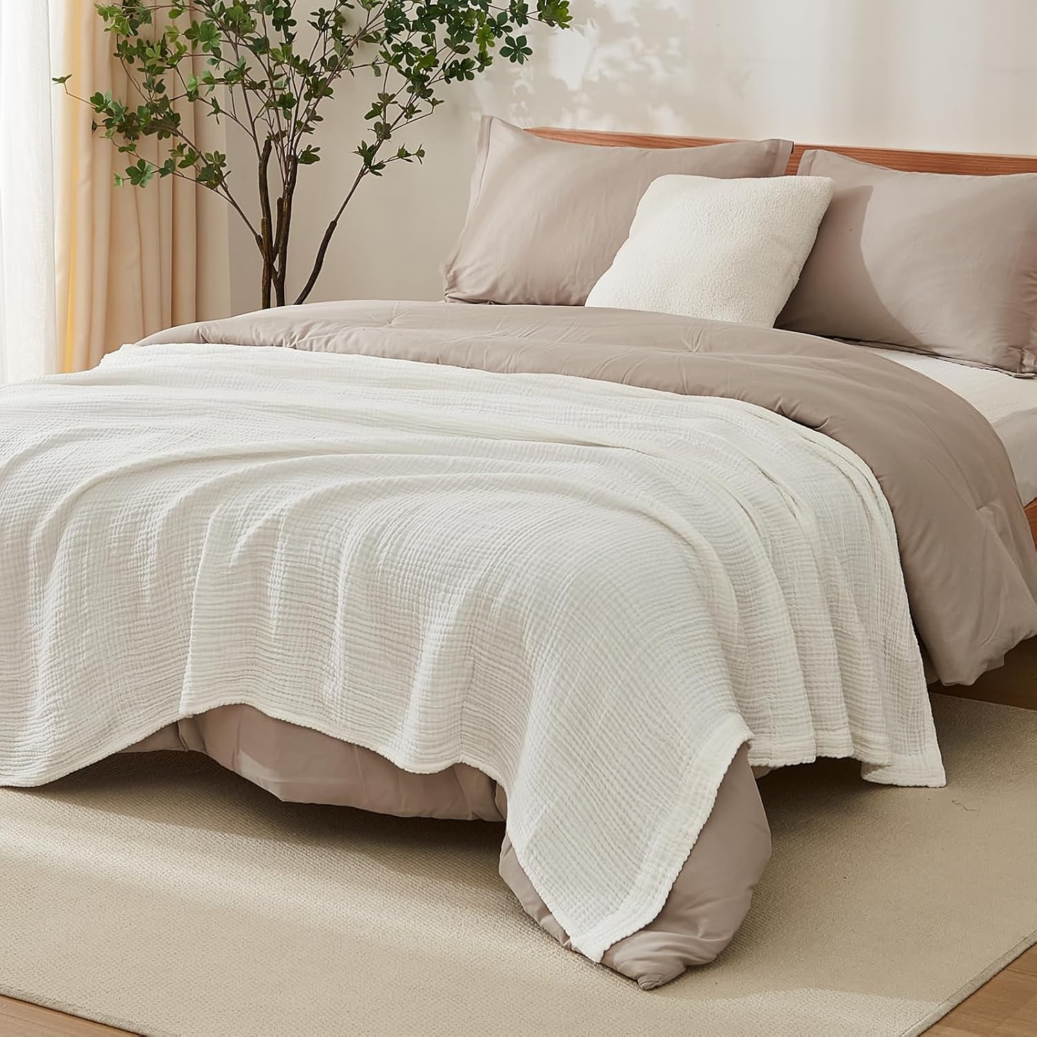 EMME held in hands showing soft cotton feel and comfort