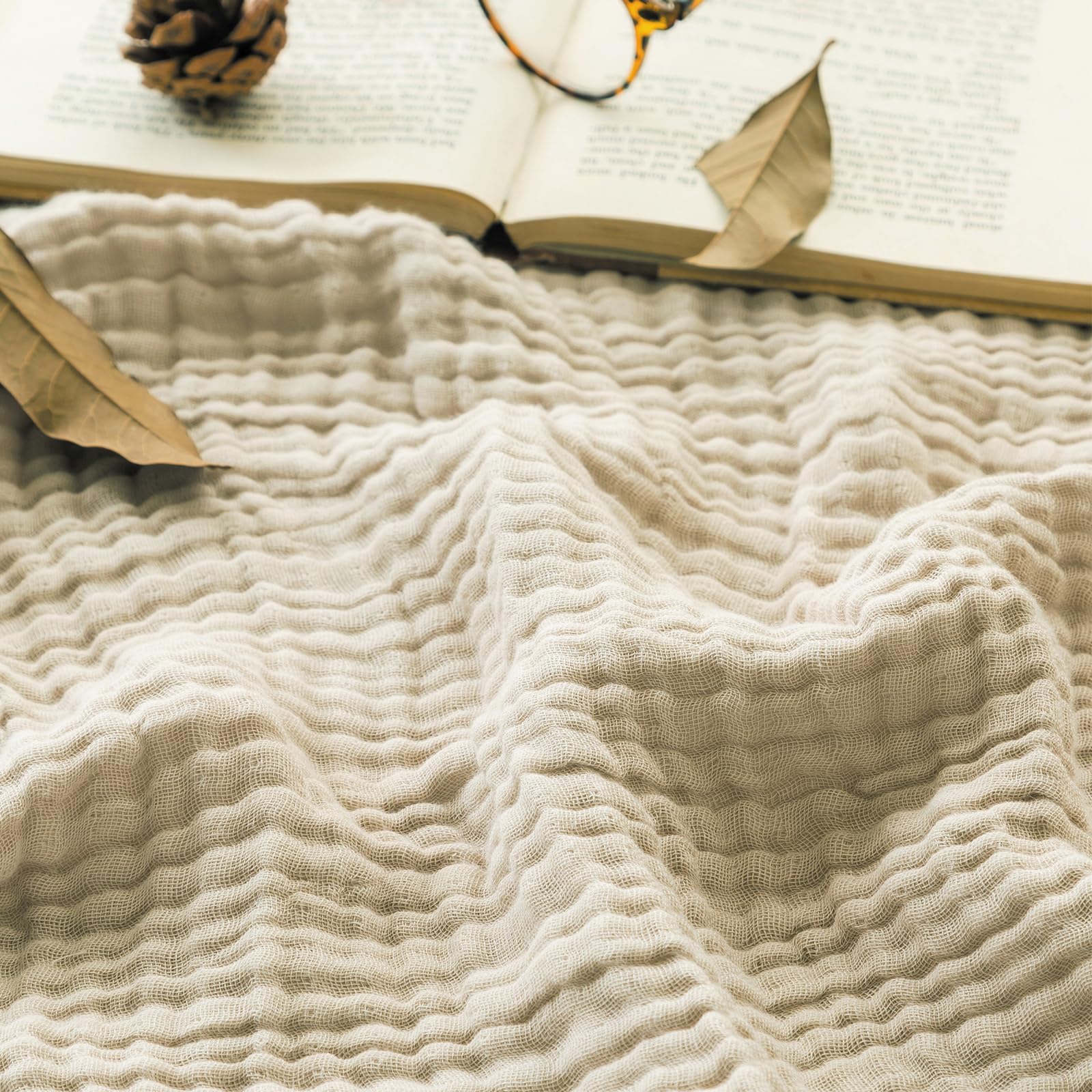 EMME front view of heather beige blanket on bed showing cozy look