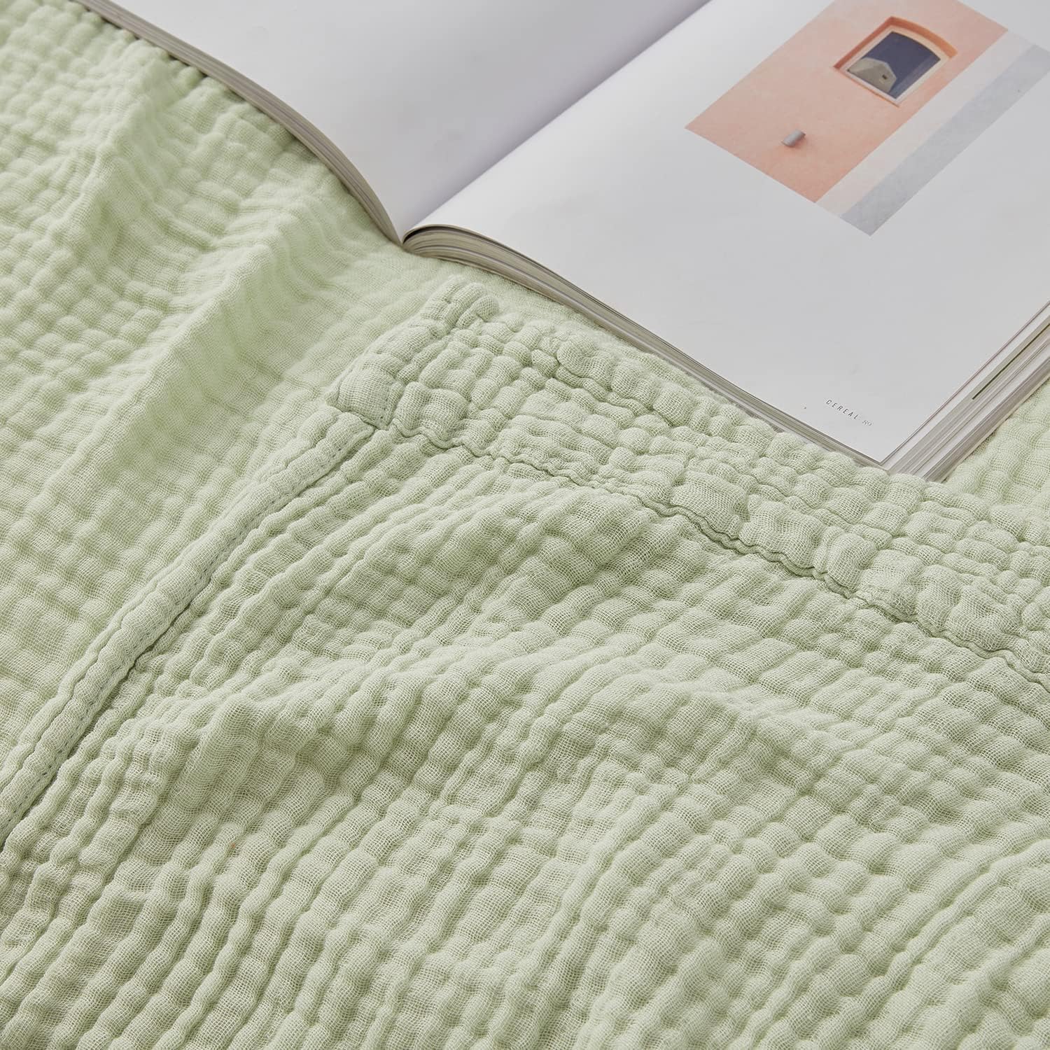 EMME mint throw front view showing color and lightweight drape, enhances living room comfort