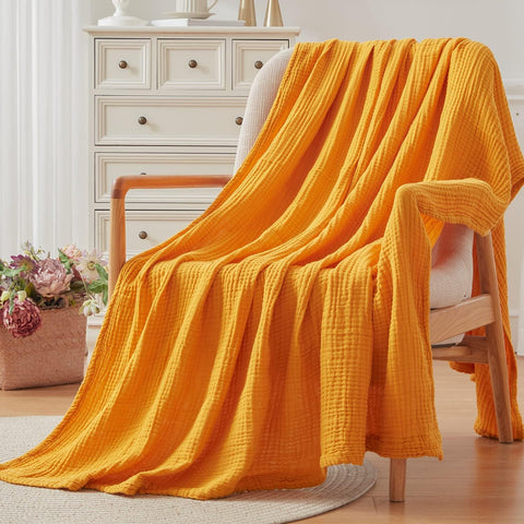 EMME blanket compactly folded for travel showing packable convenience