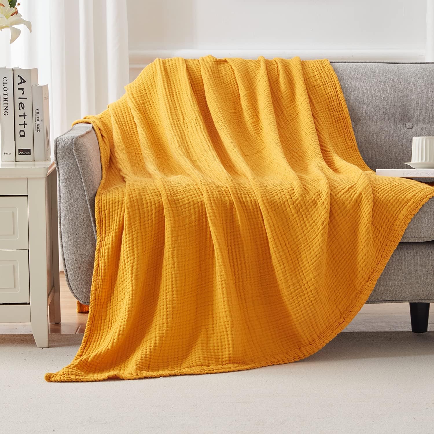 EMME blanket used as stroller cover showing breathable protection and versatility