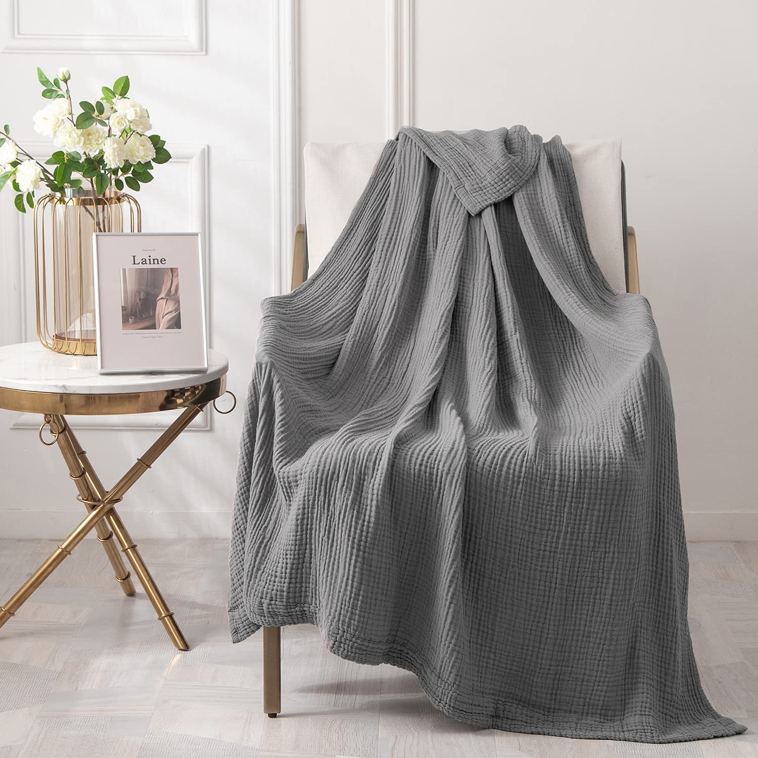 EMME rolled travel blanket demonstrating compact portability and convenience