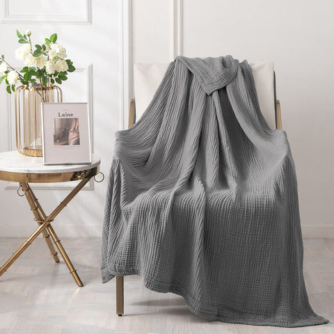 EMME rolled travel blanket demonstrating compact portability and convenience