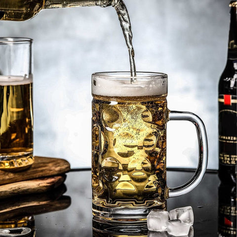 Encheng mug filled with beer demonstrating generous pour and chill