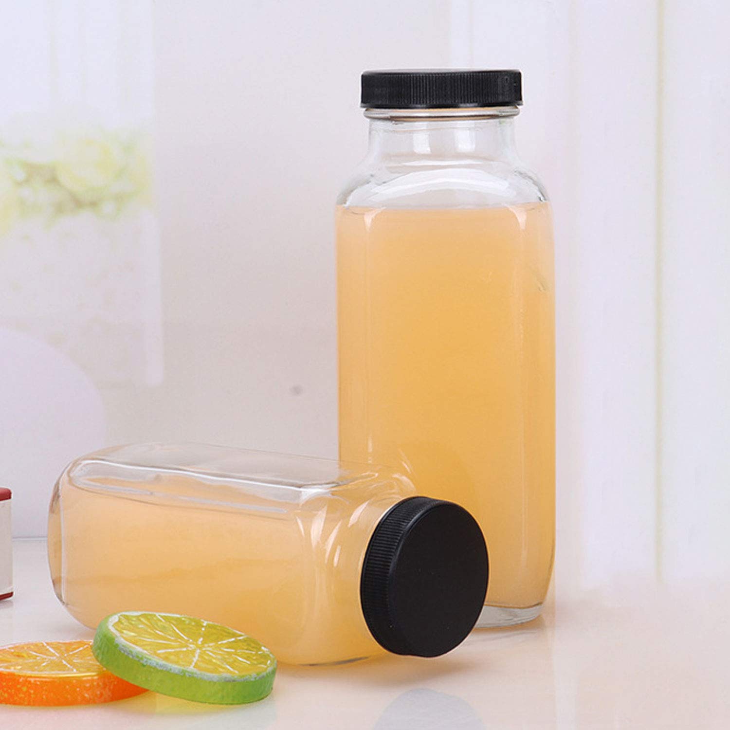 Encheng bottle in use pouring kombucha, showcasing reusable serving