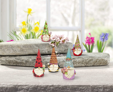 Enesco Jim Shore detailed view of quilt patterns and hand-painted motifs for visual interest