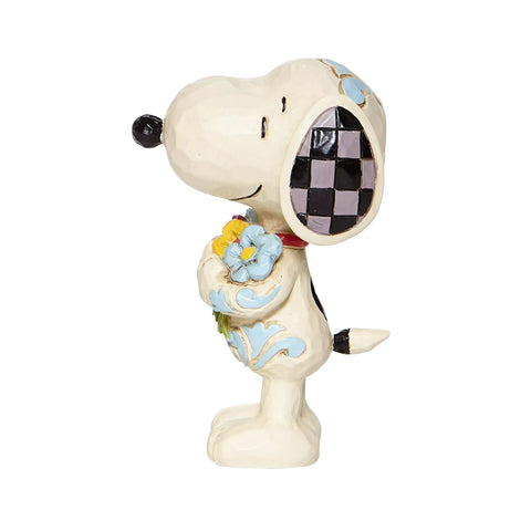 Enesco Jim Shore Snoopy angled view showing spring flowers and color accents