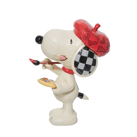 Enesco Jim Shore Snoopy styled on a shelf adding nostalgic charm to decor