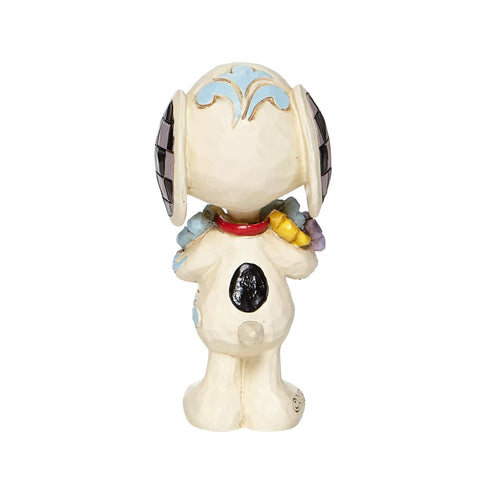 Enesco Jim Shore Snoopy on a bookshelf styling idea adding nostalgic charm