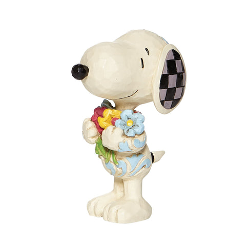 Enesco Jim Shore Snoopy next to a ruler for size comparison and display planning