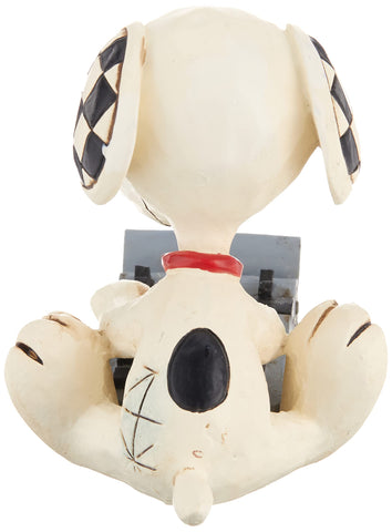 Enesco Jim Shore Snoopy close-up of folk patterns highlighting artisan-painted detail