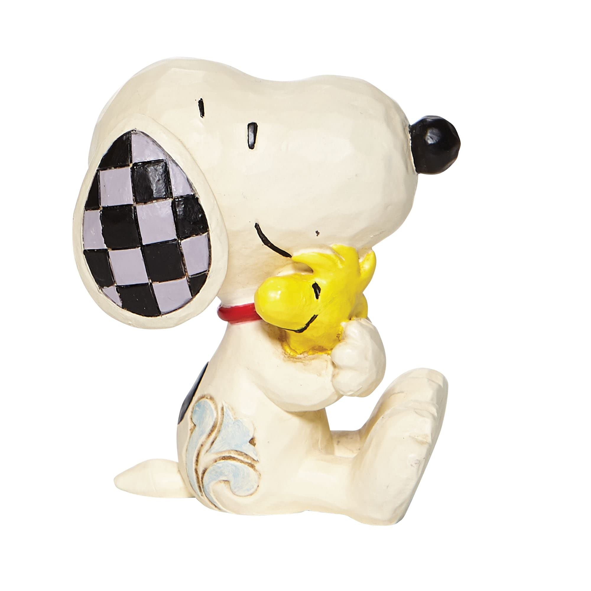 Enesco Jim Shore side profile highlighting Snoopy and Woodstock painted detail