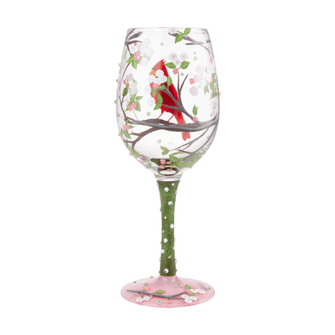 Enesco glass held in hand to show scale and comfortable 15-ounce capacity benefit