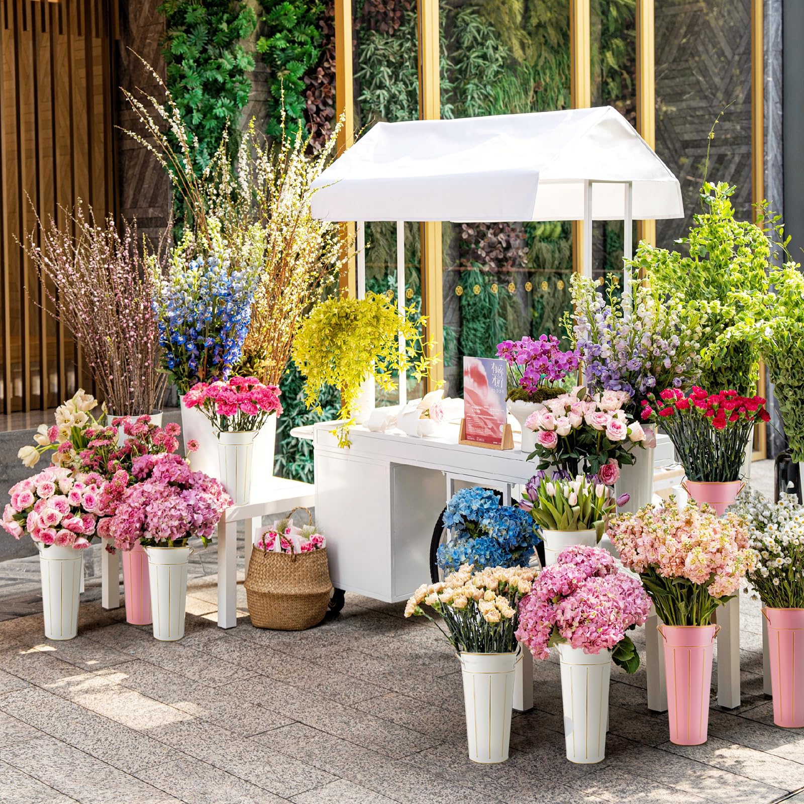 Entjor buckets arranged with flowers illustrating decorative use