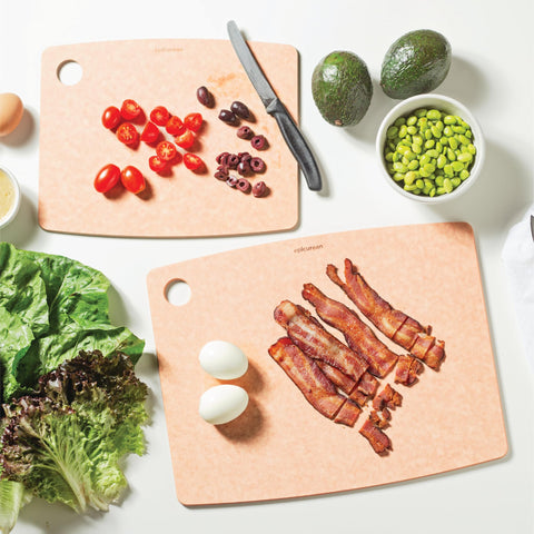 Epicurean board on counter with measuring tool showing true 11.5 by 9 inch scale