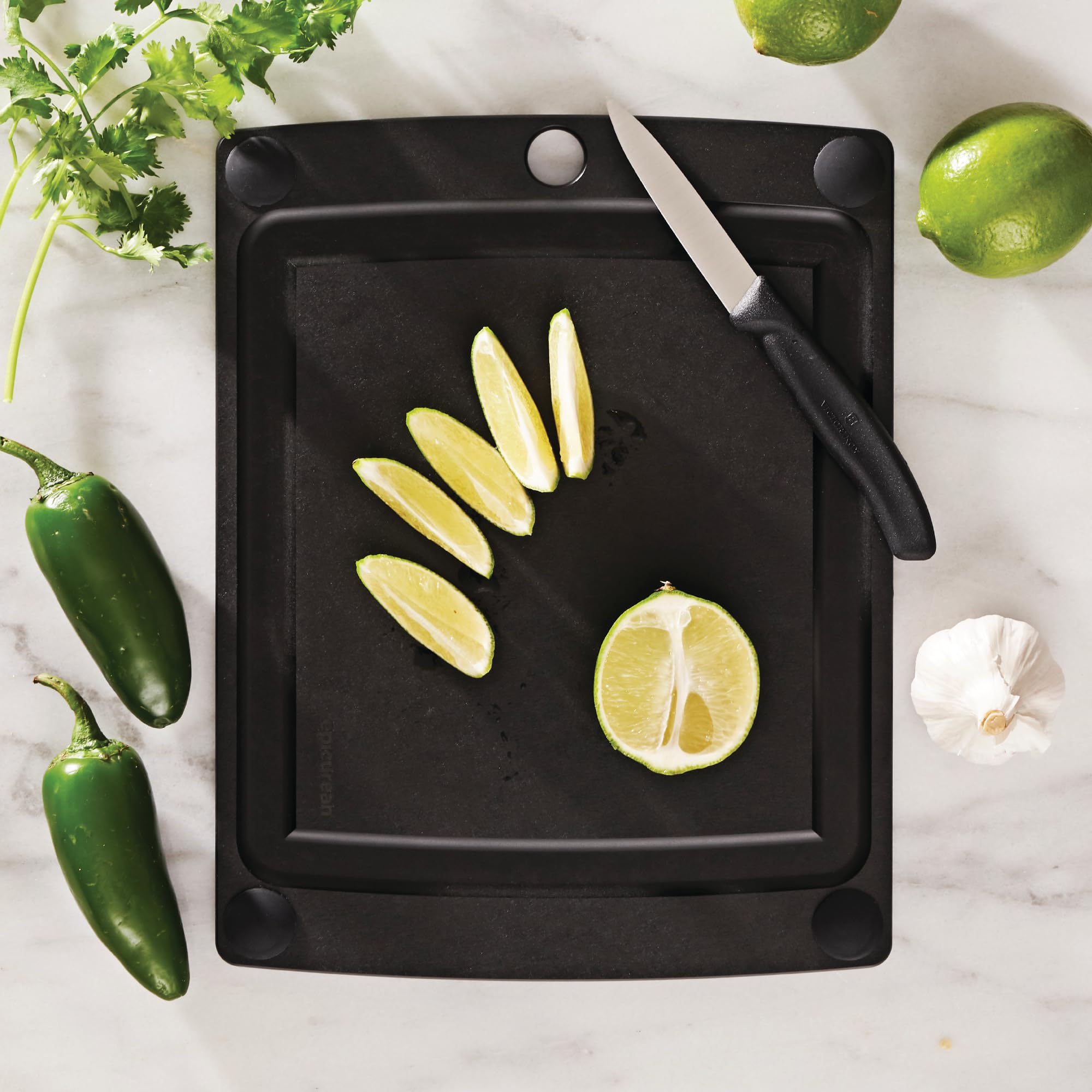 Epicurean closeup of juice groove captures liquids and keeps counters clean