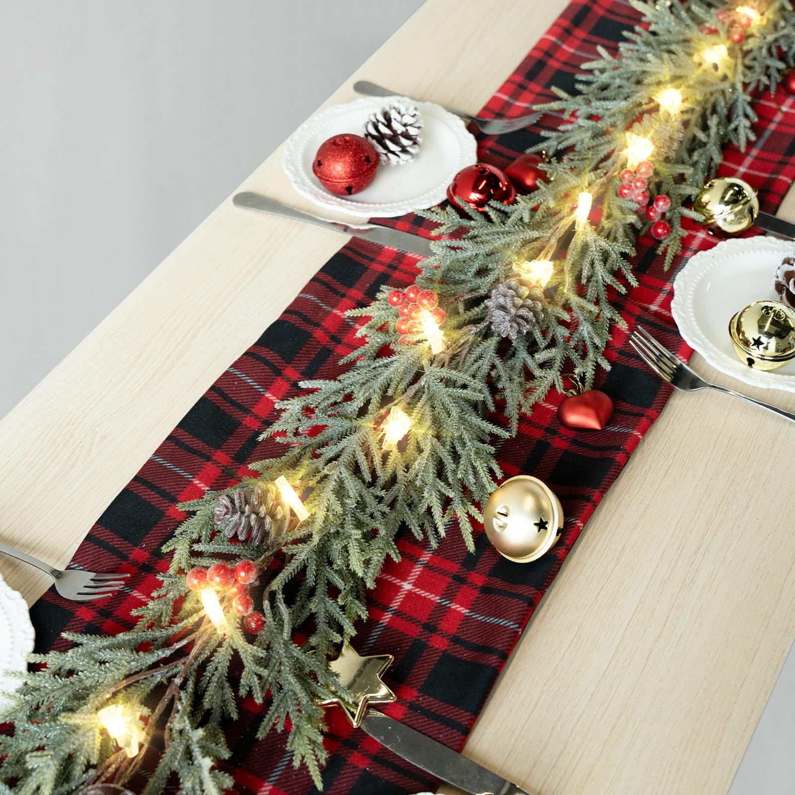 Eqanro red berries and pine cones detail adding festive accents