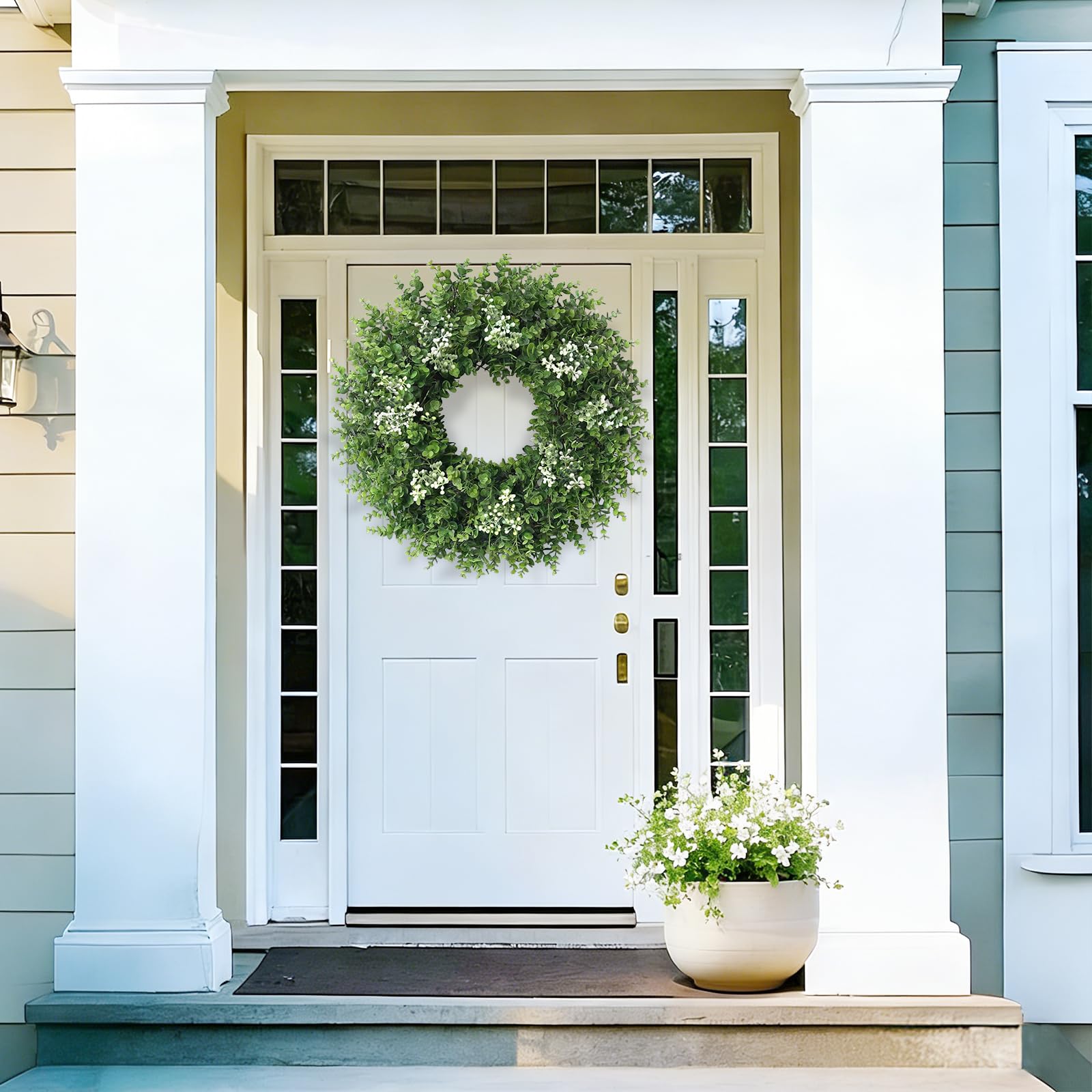 Eqanro wreath displayed on porch adding year-round curb appeal