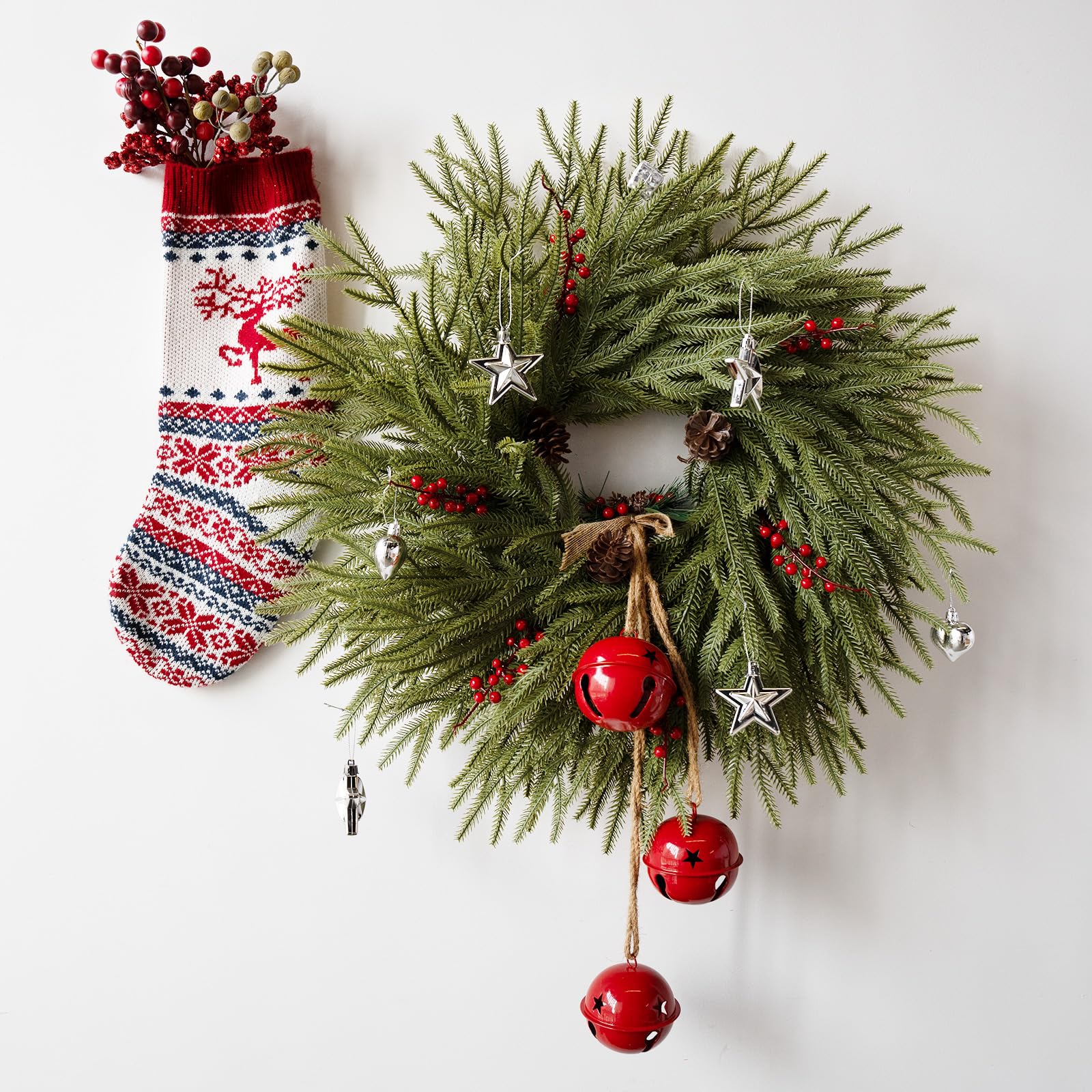 Eqanro wreath hung on a wooden front door adding farmhouse charm