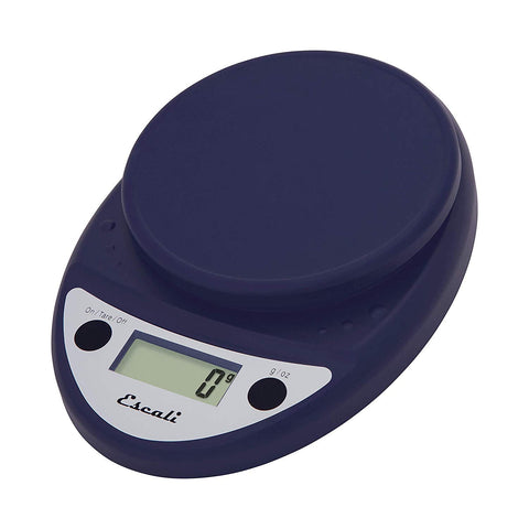 Escali Primo front view in royal blue showing compact footprint and readable display