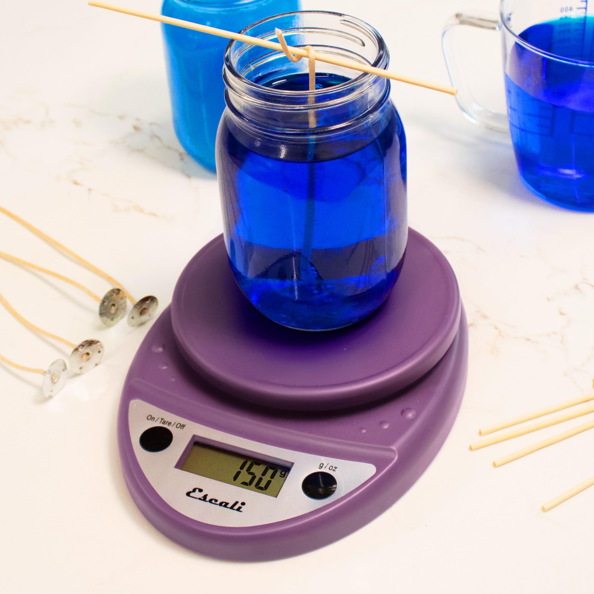 Escali Primo in use weighing flour to illustrate precise measurements for baking