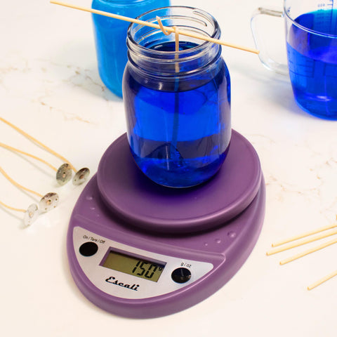 Escali Primo in use weighing flour to illustrate precise measurements for baking