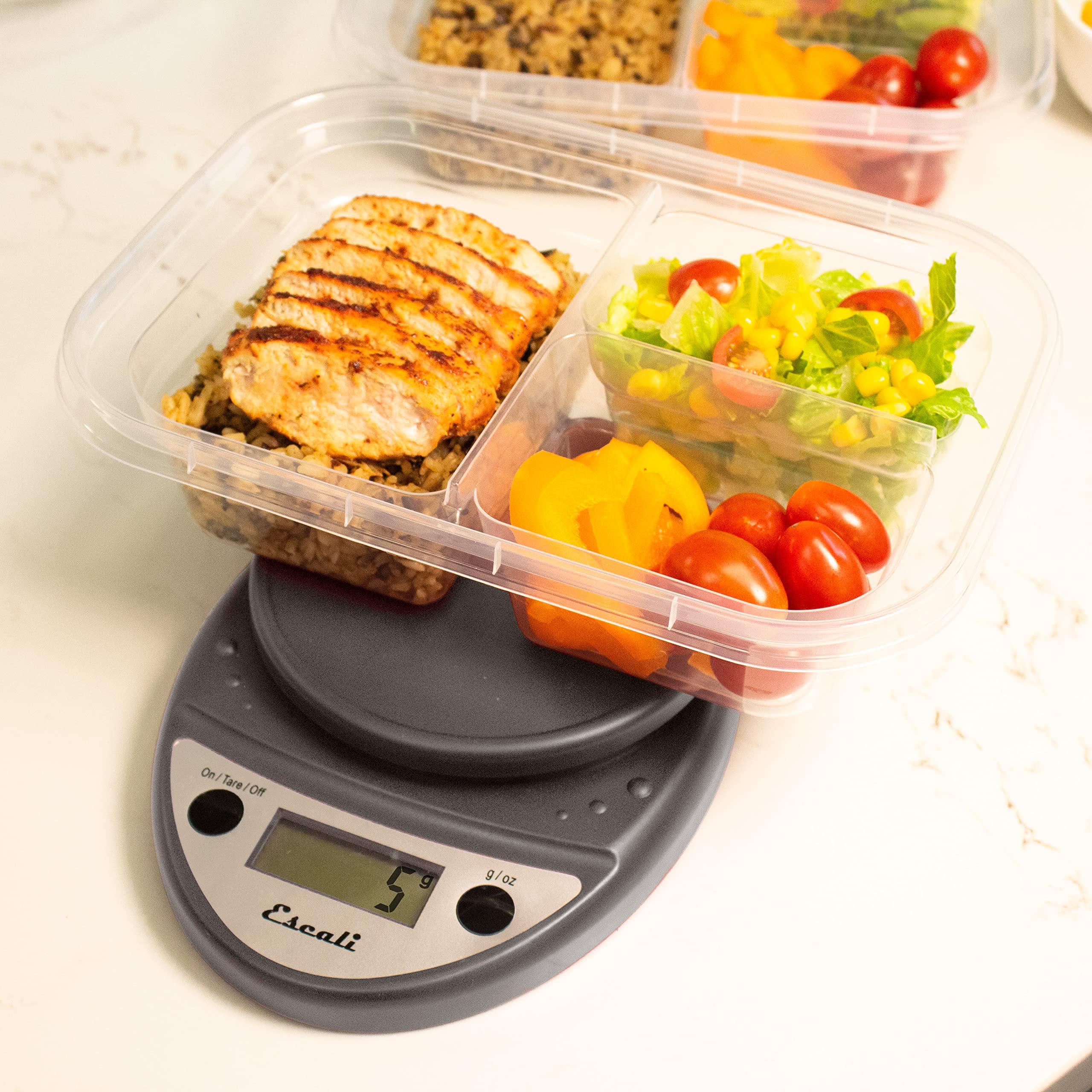 Stainless steel platform accessory on Escali Primo showing dishwasher-safe protection