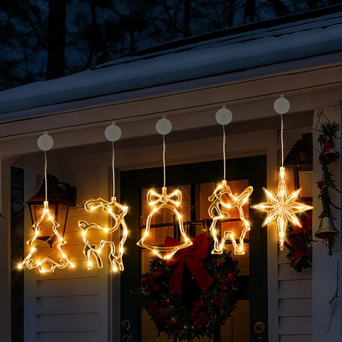 Esnendir silhouettes arranged on a mantel with garland, adding cozy holiday ambiance benefit