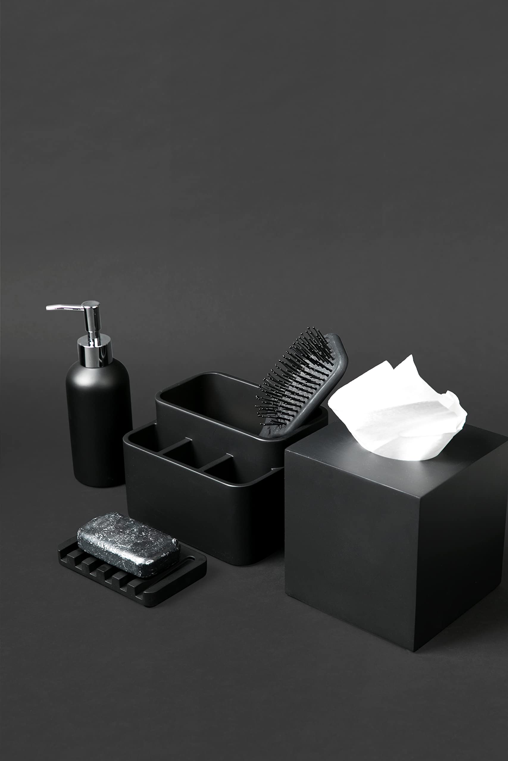 Essentra Home matte black cover on bathroom counter complementing black fixtures and organization