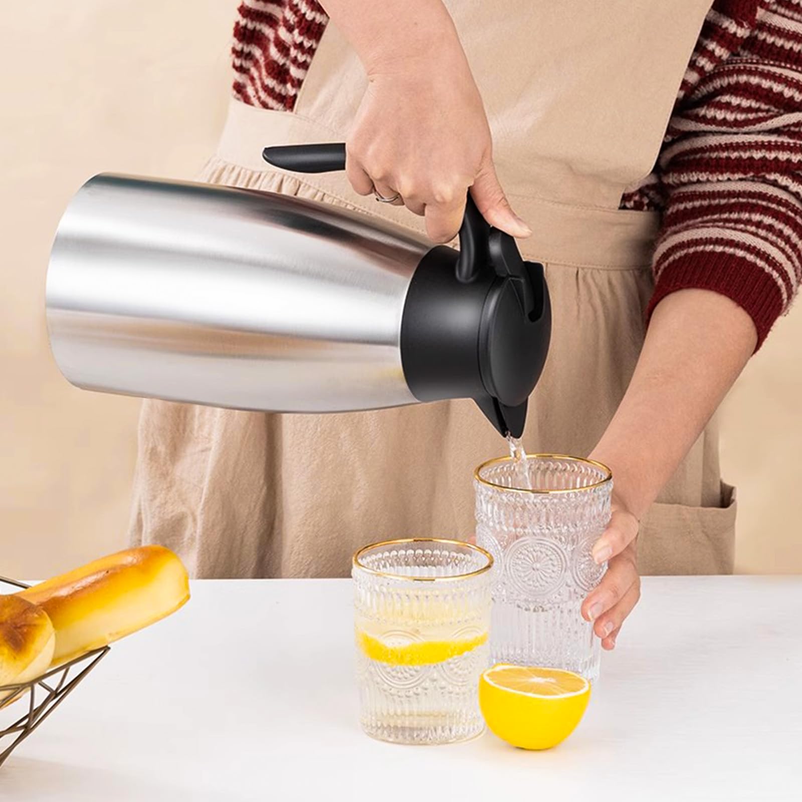 Essenya carafe on kitchen counter being poured for effortless entertaining