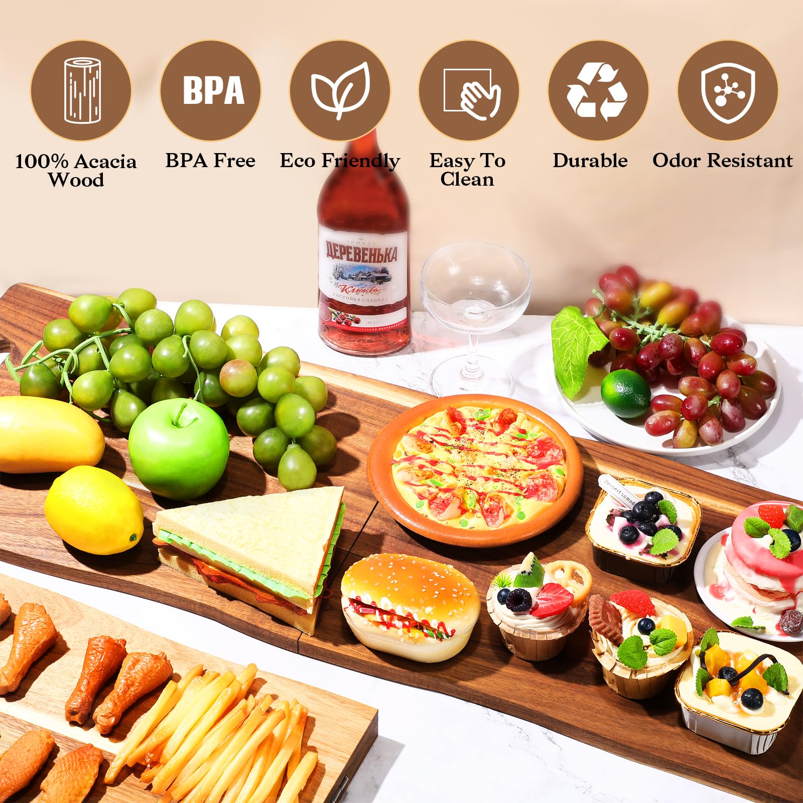 Essenya serving board in use with party spread illustrating generous presentation capacity