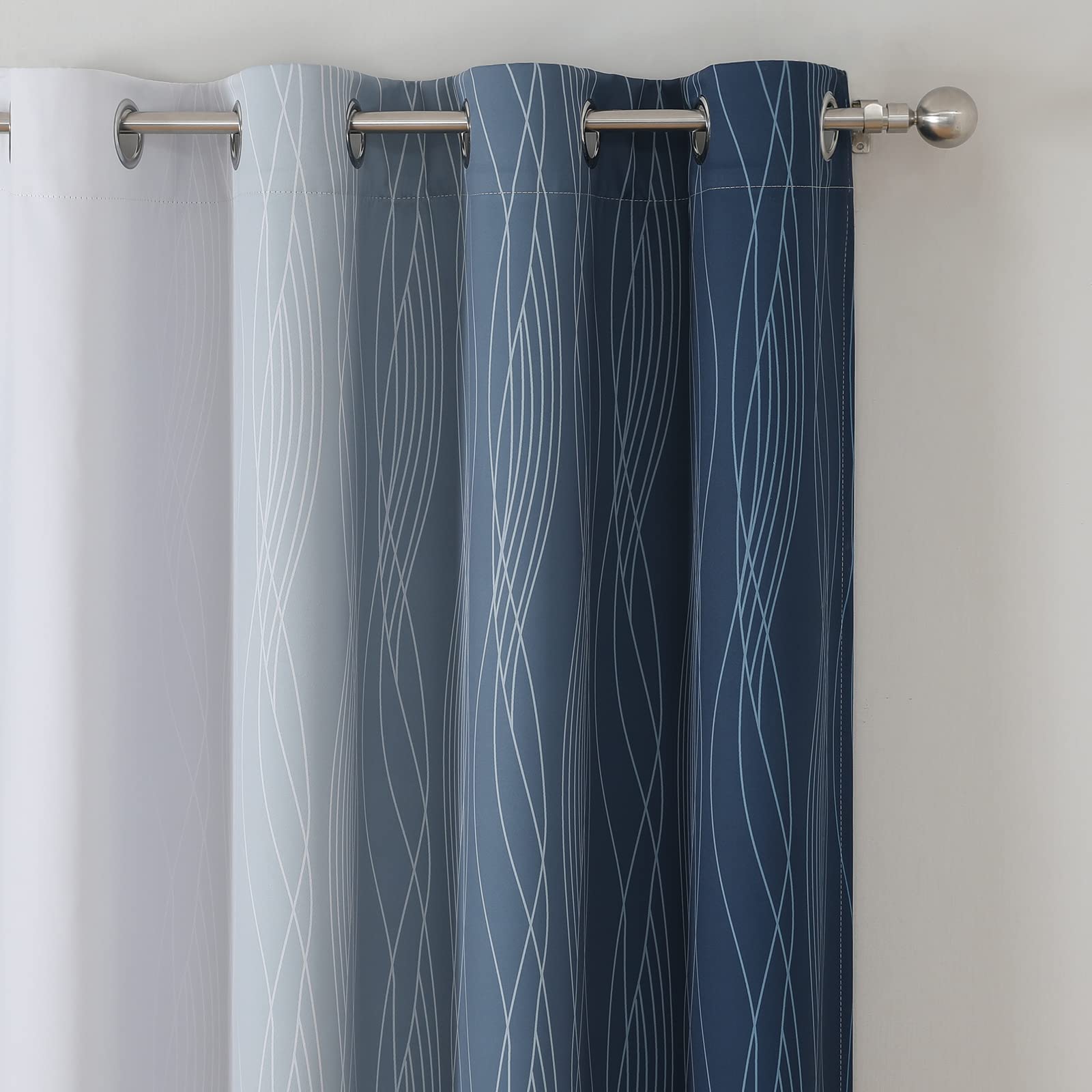 Estelar Textiler staged living room with curtains reducing glare and enhancing decor