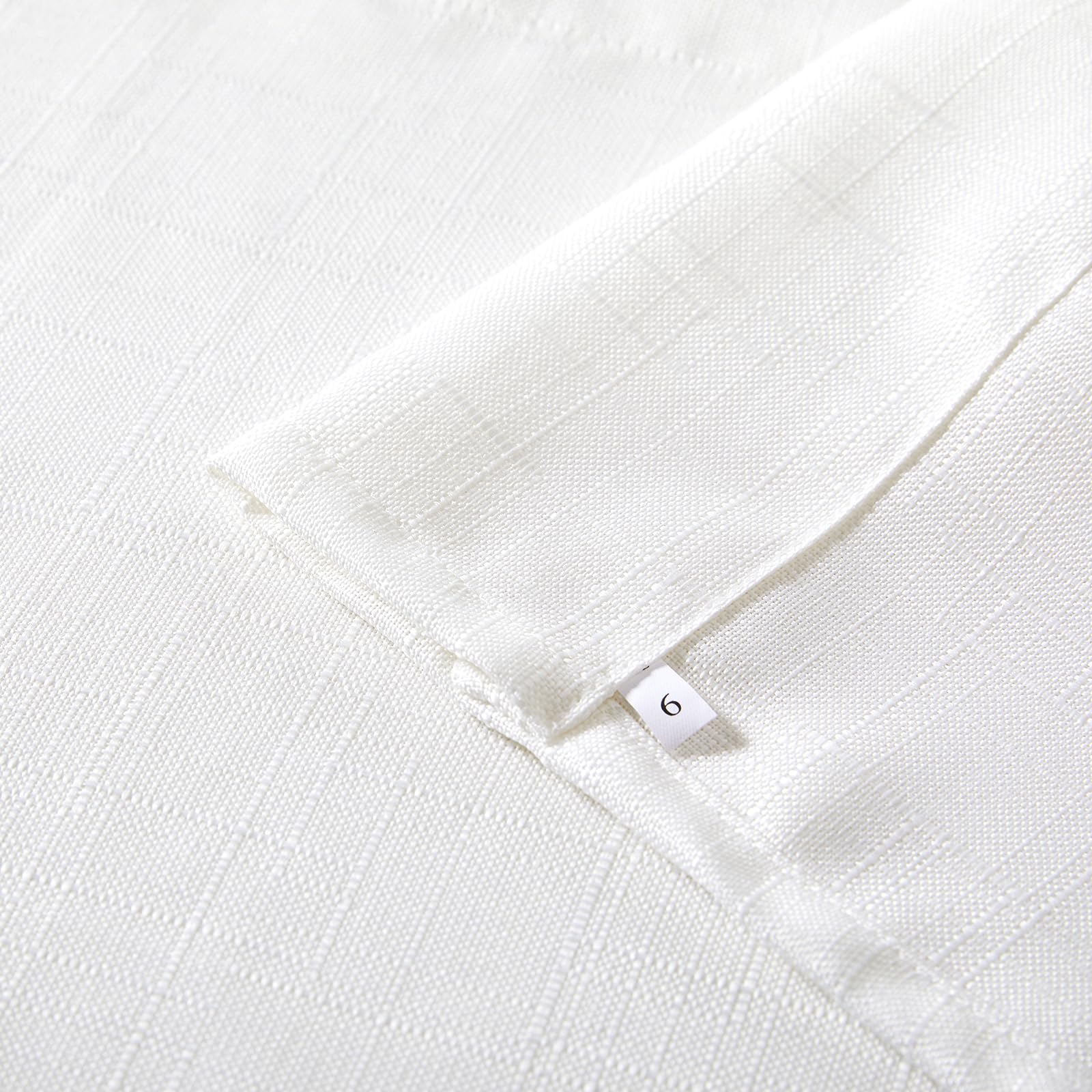Estmy rod pocket and top hem detail for easy hanging and neat finish