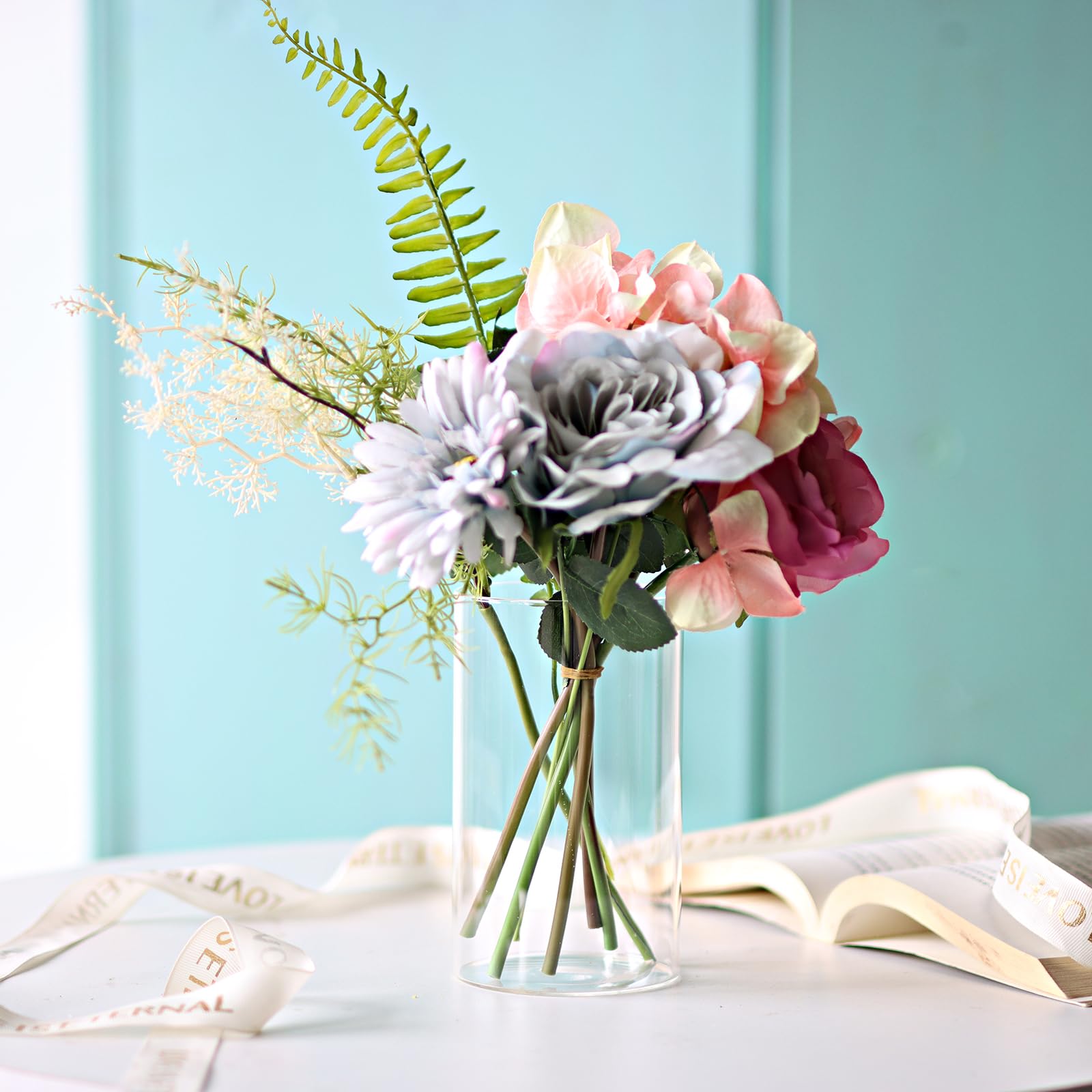 Etolies cluster of vases used as table centerpiece offering cohesive styling