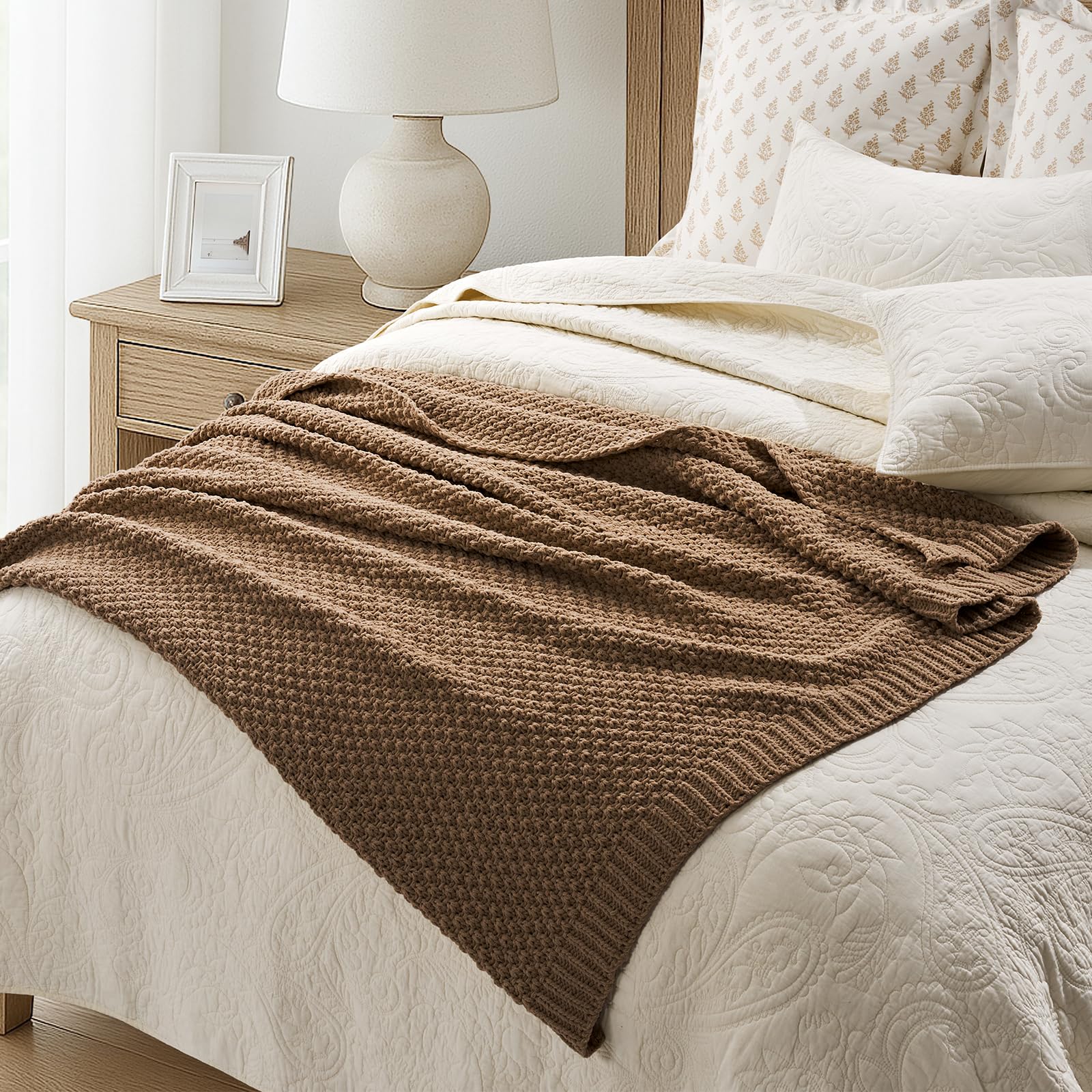 EverGrace throw styled at foot of bed layers texture and neutral tone