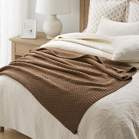 EverGrace throw styled at foot of bed layers texture and neutral tone