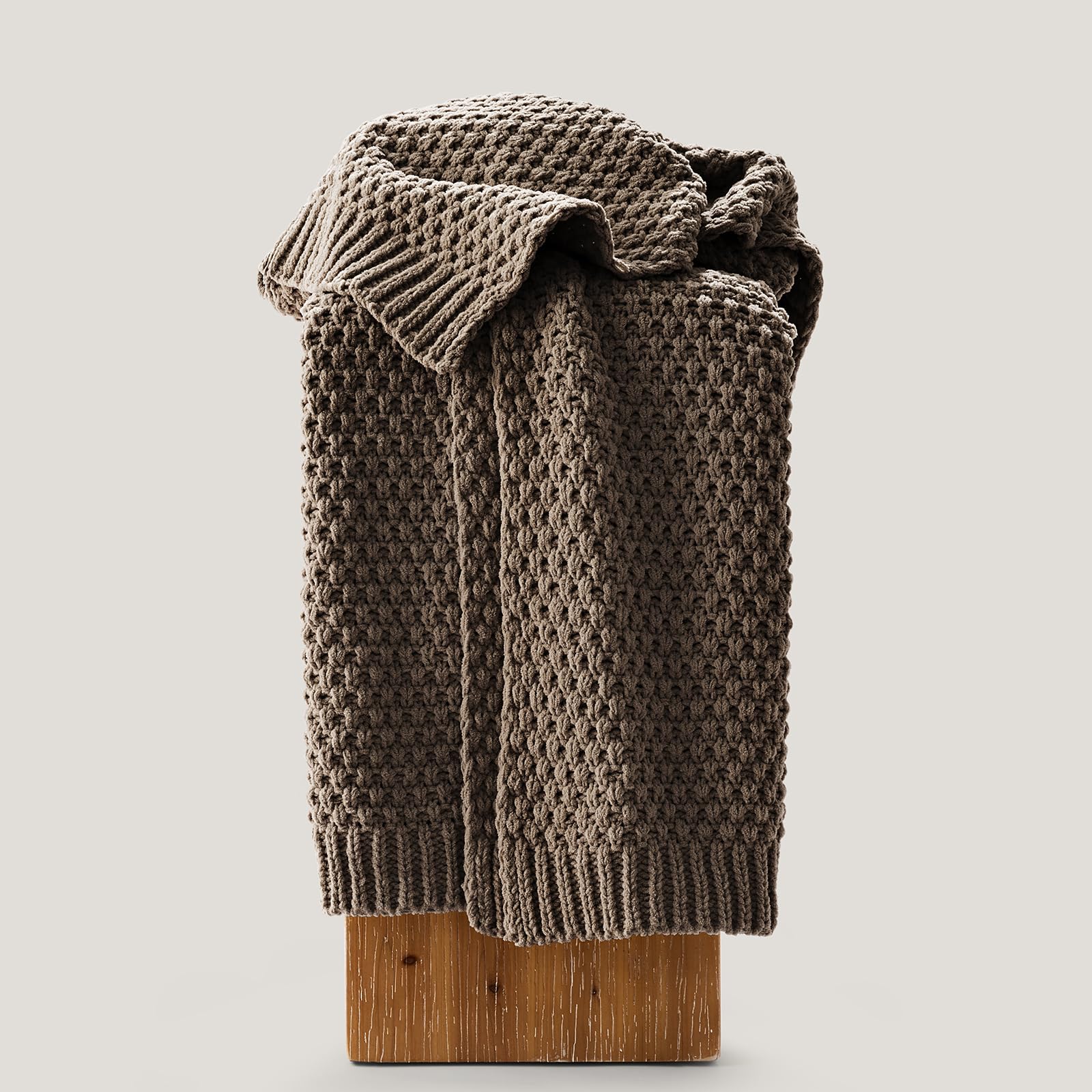 EverGrace neatly folded on bed demonstrating layering and bedroom styling benefit