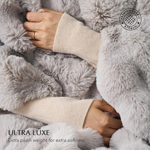 EverGrace folded throw blanket on bed showing generous 60x80 size and cozy layering