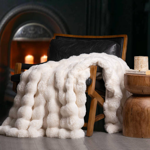 EverGrace front view ivory throw showing size and elegant finish, adds instant warmth