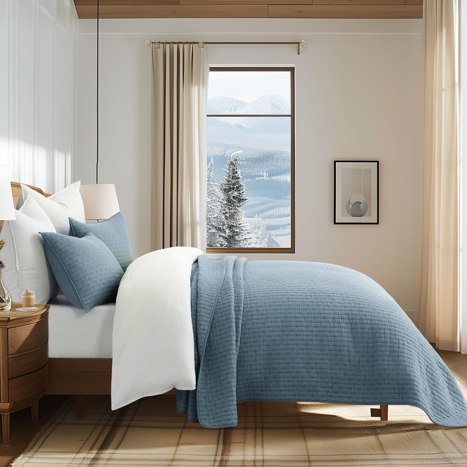EverGrace king quilt on styled bed demonstrating drape and layered bedroom look