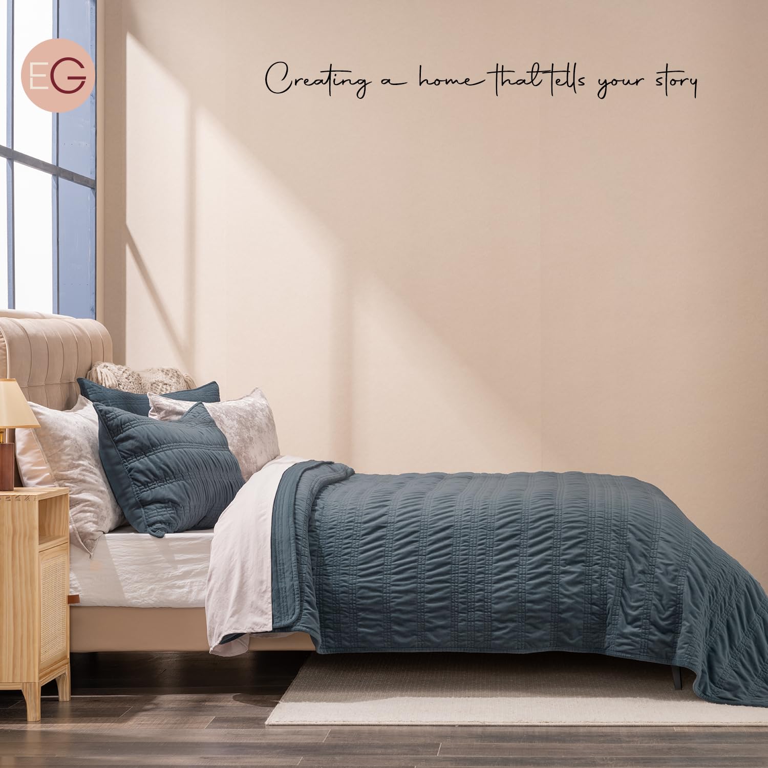 EverGrace king quilt styled on bed in room to show full drape and scale